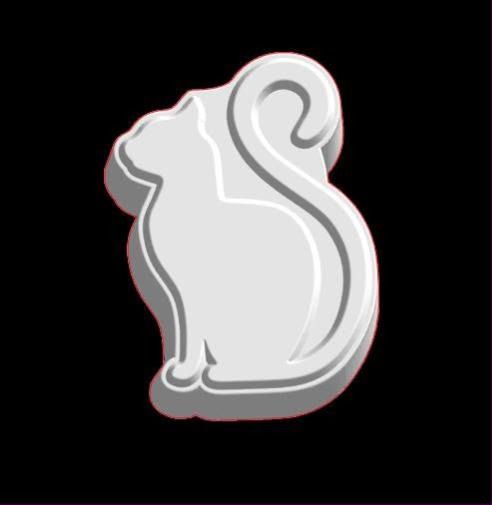 Sitting cat silhouette mold with pointed ears and a long tail hooked up over its back.
