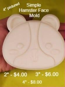 Cream hamster face casting with small round ears, dot eyes and full pushed-out cheeks