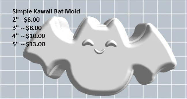 Cute kawaii bat mold with pointed ears, a happy closed-eye face, blush cheeks and scalloped wings.