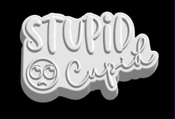 Mold reading STUPiD in bold capitals over Cupid in script with a small sulking cartoon face.