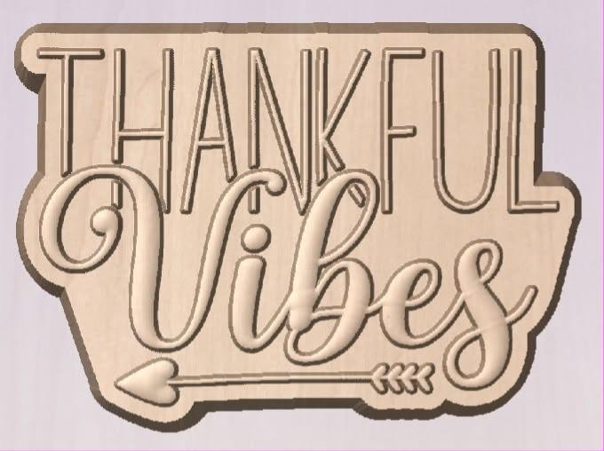 Mold reading THANKFUL in outlined capitals over Vibes in script with a feathered arrow beneath.