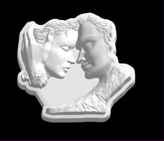 Double bust mold of a couple with foreheads touching and eyes closed, set on a stepped base.