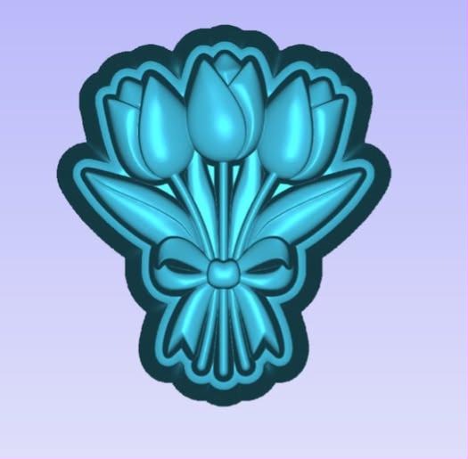 Bouquet mold with five tulips and long leaves, stems tied under a ribbon bow with hanging tails.
