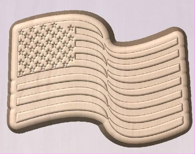 Carved mold of a waving American flag with a star-filled canton and rippling stripes.