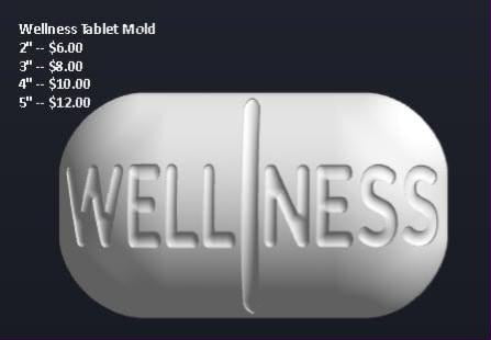 White oval tablet casting with WELLNESS across the face and a vertical score line through the middle