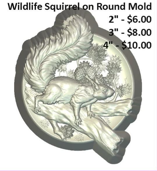 Round disc mold with a squirrel stretched along a branch, bushy tail raised, among pine boughs.