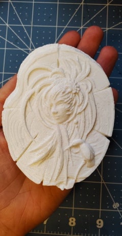 Woman's Face in Wood Mold